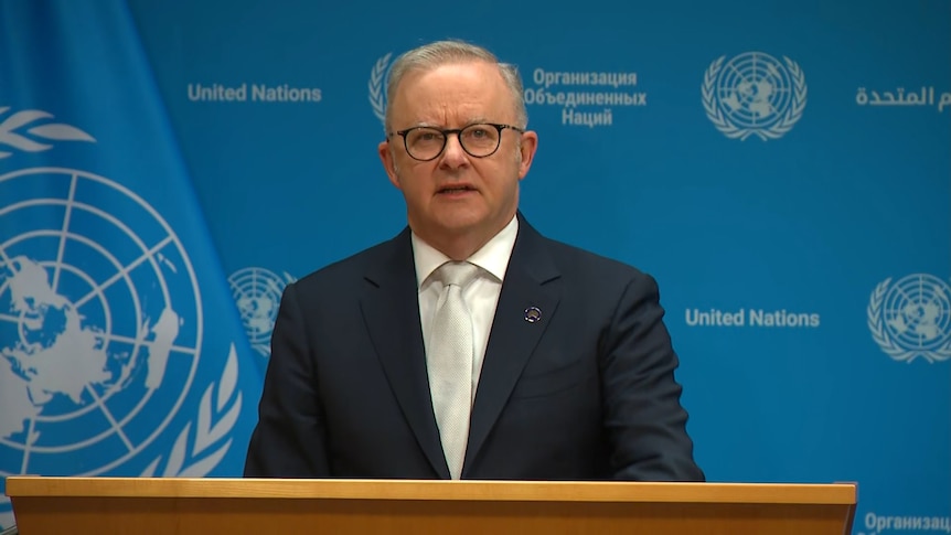 Anthony Albanese speaking at the United Nations press lectern in New York.